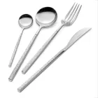 24 polerade smidda stålbestick med origami tillverkade i Italien - Osaka Viadurini