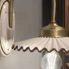 Plisserad blank keramisk applikation och handmålad kant - Laquila Viadurini