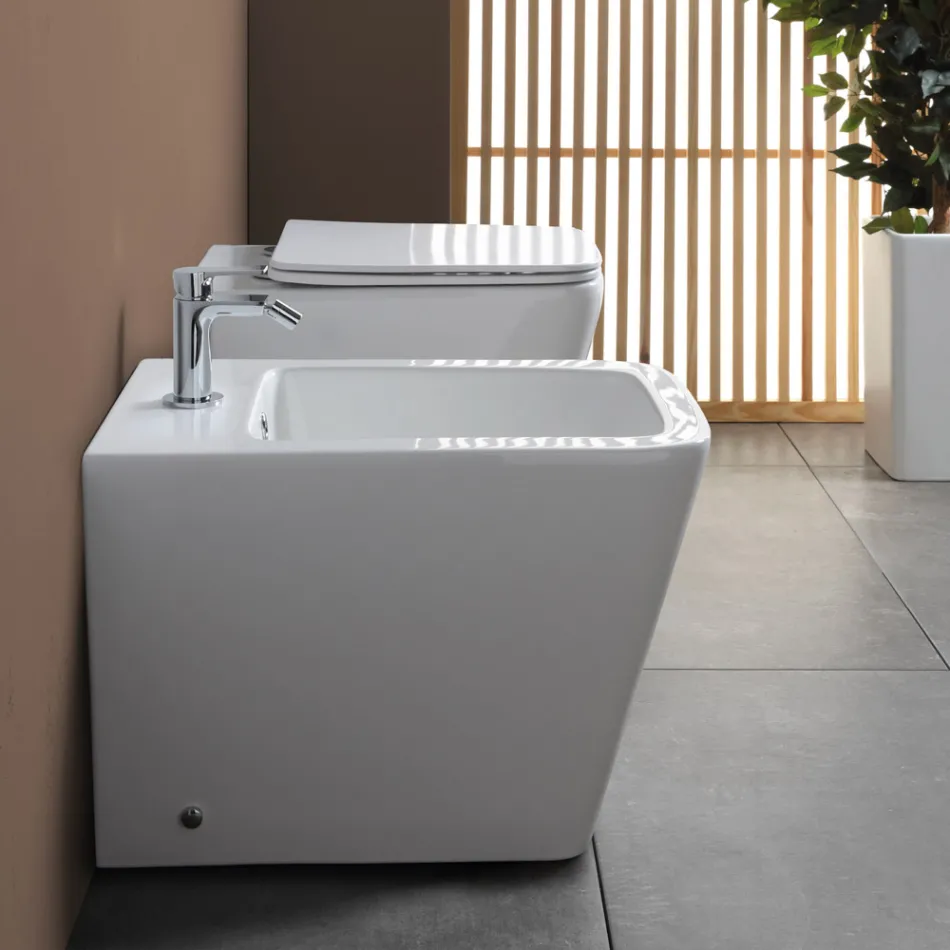 Golvmonterad bidé med ett hål i vit keramik med elegant modern design - Giunco Viadurini
