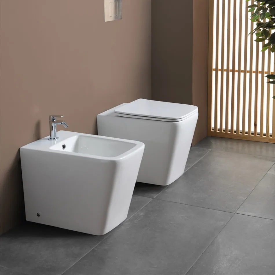 Golvmonterad bidé med ett hål i vit keramik med elegant modern design - Giunco Viadurini
