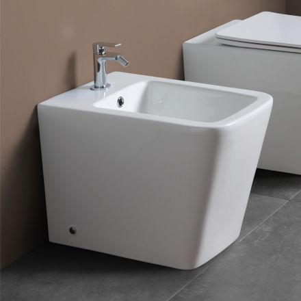 Golvmonterad bidé med ett hål i vit keramik med elegant modern design - Giunco Viadurini