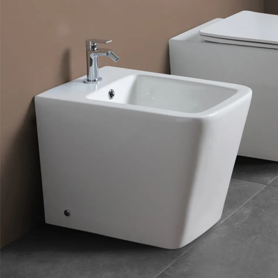 Golvmonterad bidé med ett hål i vit keramik med elegant modern design - Giunco Viadurini