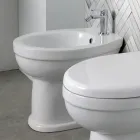 Golvmonterad bidé med ett hål i vit keramik med elegant modern design - Silica Viadurini