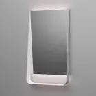 Badrumskomposition med puderrosa lådor, handfat och spegel - Elios Viadurini