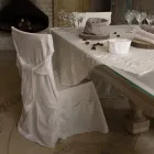 Elegant stolsöverdrag för vardagsrum i färgad bomull med ryggstöd - Filippa Viadurini