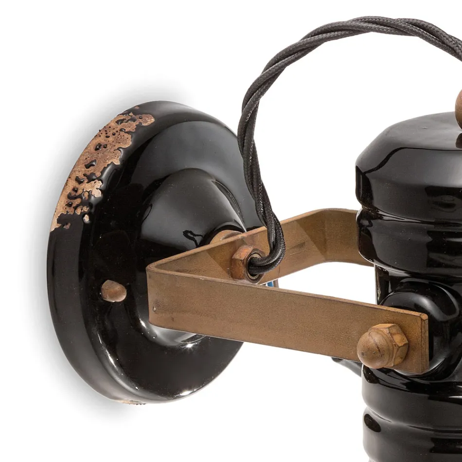 Vägglampa i järn och industriell handgjord keramik - Urban Viadurini