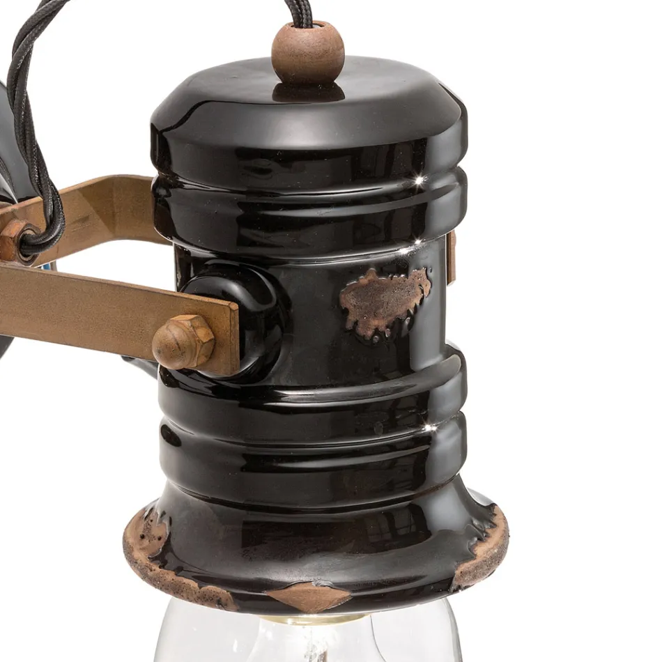 Vägglampa i järn och industriell handgjord keramik - Urban Viadurini