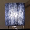 Golvlampa i mässing och färgad ull tillverkad i Italien Evita