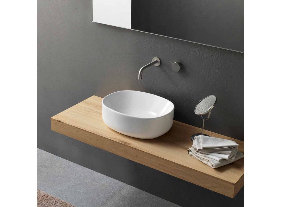Modernt oval tvättställ för bänkskiva i vit keramik - Ventori2 Viadurini