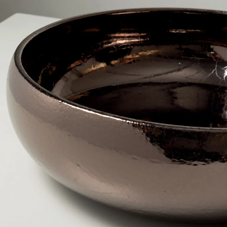 Handdrejad diskbänk i metallisk Raku-lera - Prisma Viadurini