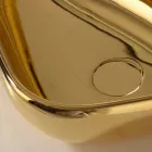 Modernt bänkskål i guld keramik gjord i Italien Sofia Viadurini