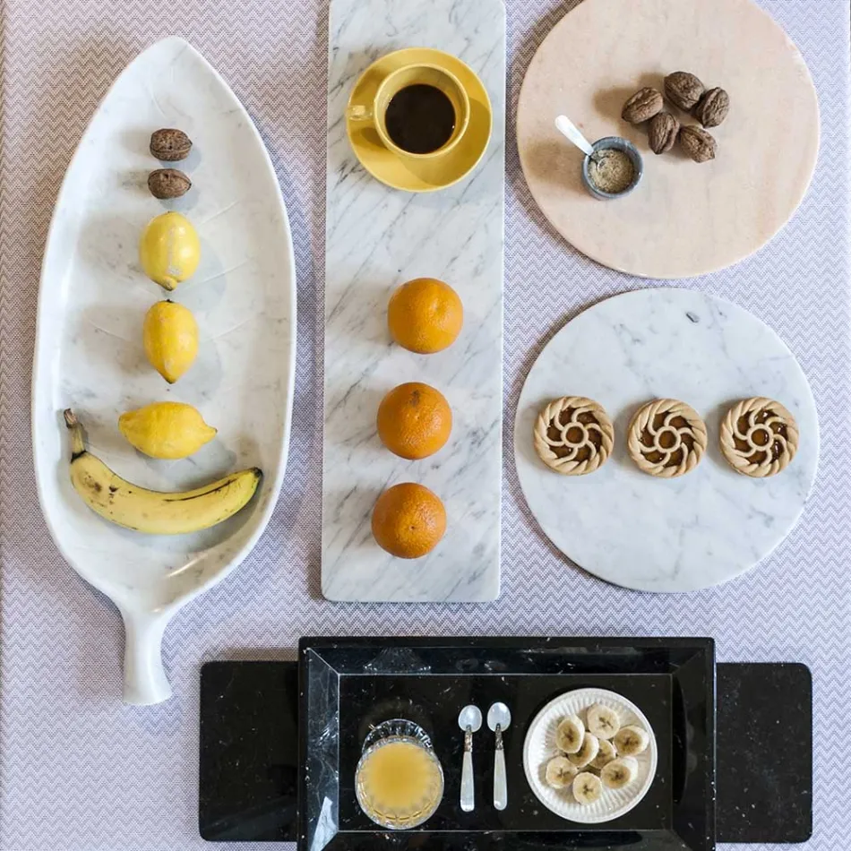 Rund ostplatta i vit eller svart marmor tillverkad i Italien - Kirby Viadurini