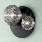 Vägglampa i blåst glas med metallstruktur - svala Viadurini