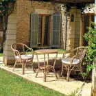 Stapelbar trädgårdsfåtölj utomhus i naturrotting - Spora Viadurini