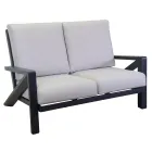 Vardagsrum bestående av soffa, soffbord och fåtöljer med fotstöd - Anslagstavla Viadurini