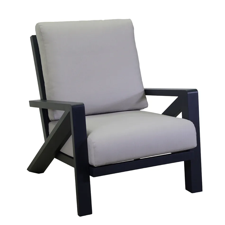 Vardagsrum bestående av soffa, soffbord och fåtöljer med fotstöd - Anslagstavla Viadurini