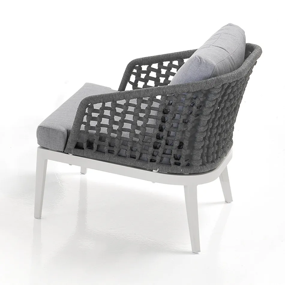 Vardagsrum inomhus och utomhus med 2 fåtöljer, 1 soffa och 1 soffbord - Sortir Viadurini