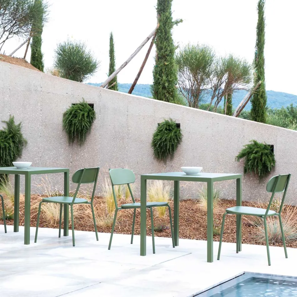Stapelbar utomhusstol i färgad metall Tillverkad i Italien 4 delar - Pixie Viadurini