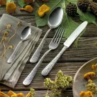 Set med 24 bestick i polerat stål med gravyr Made in Italy - Nara Viadurini