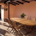 Utdragbart Design Trädgårdsbord upp till 200 cm Ovalt i trä - Roxen Viadurini