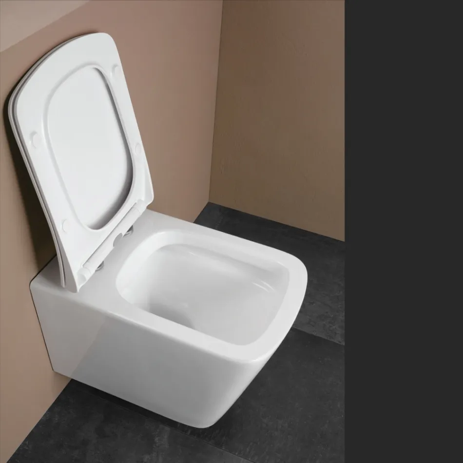 Vägghängd toalett med mjukstängande keramiksits i modern design - Giunco Viadurini