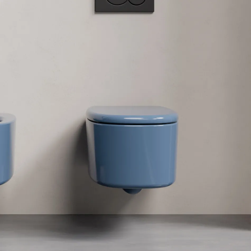 Vägghängd toalettstol i keramik i olika färger tillverkad i Italien - Flicka Viadurini